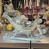 TRINEO BLANCO CON PLATA 27 CM X 50 CM