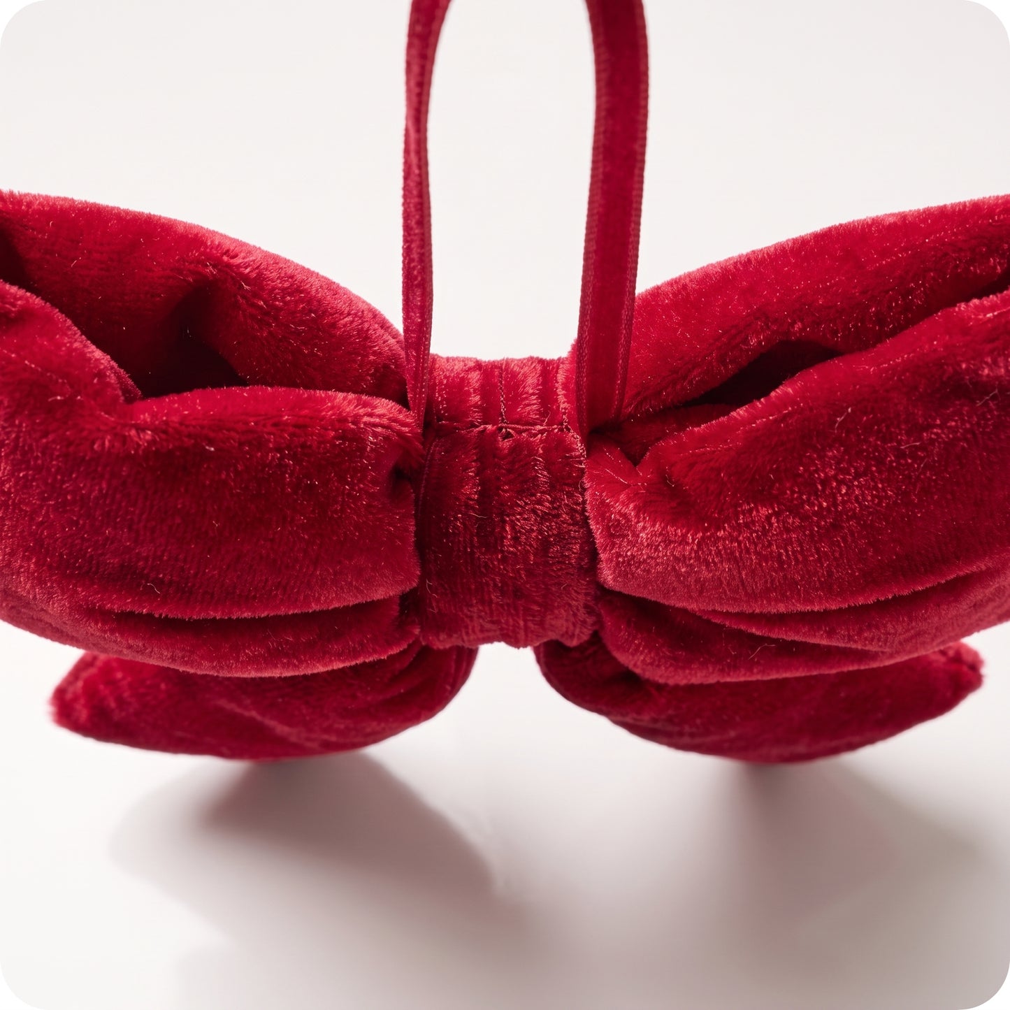 Moño de terciopelo rojo ahaltado