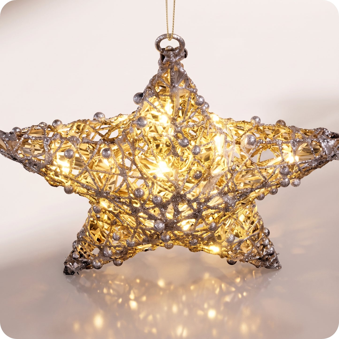 Estrella metalica de red con luz led calida