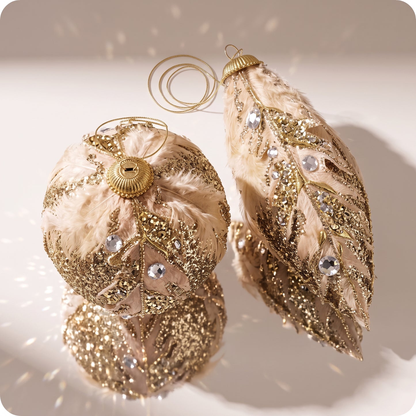 Esferas athus con piedras y plumas 12 y 18 cm