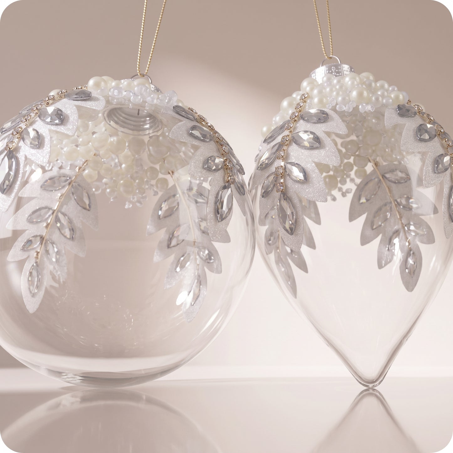 Esferas de vidrio blanco con flores en la punta brillantes 11 y 16 cm