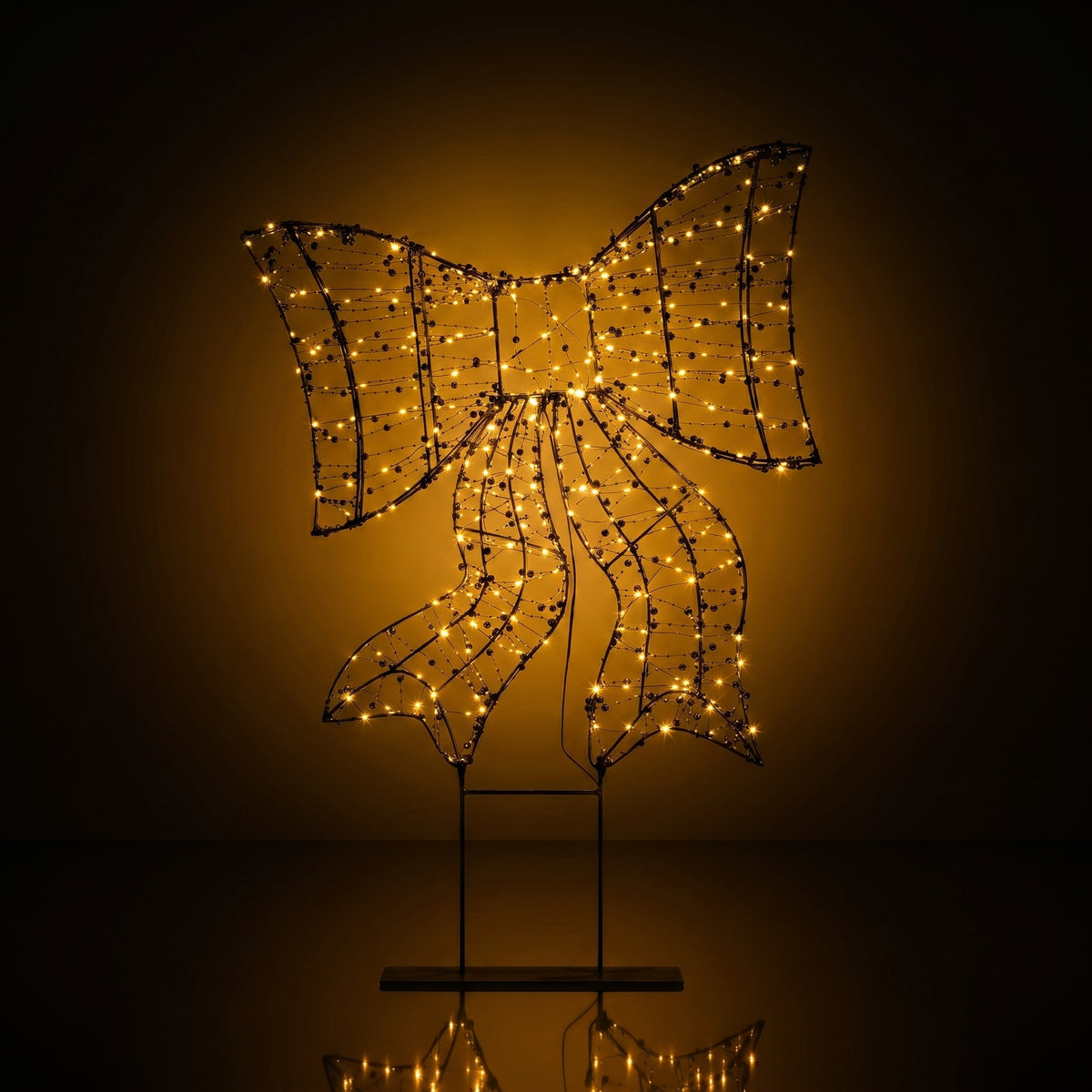 Moño de luz LED con perlas decorativas