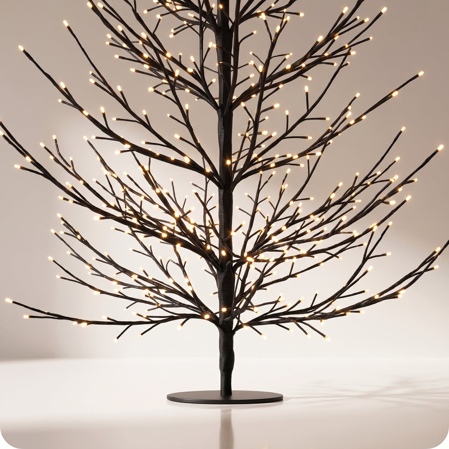 Árbol negro de puntos negro con luz calida 120 cm