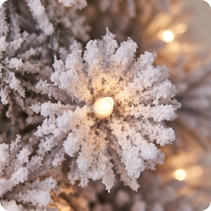 Árbol iceland nevado con luz led calida