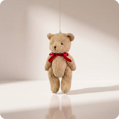 Teddy bear marrón con lazo rojo grande