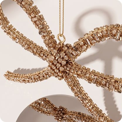 Esfera moño dorado con piedras y brillos rigido 14 cm