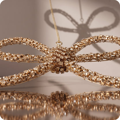 Esfera moño dorado con piedras y brillos rigido 14 cm