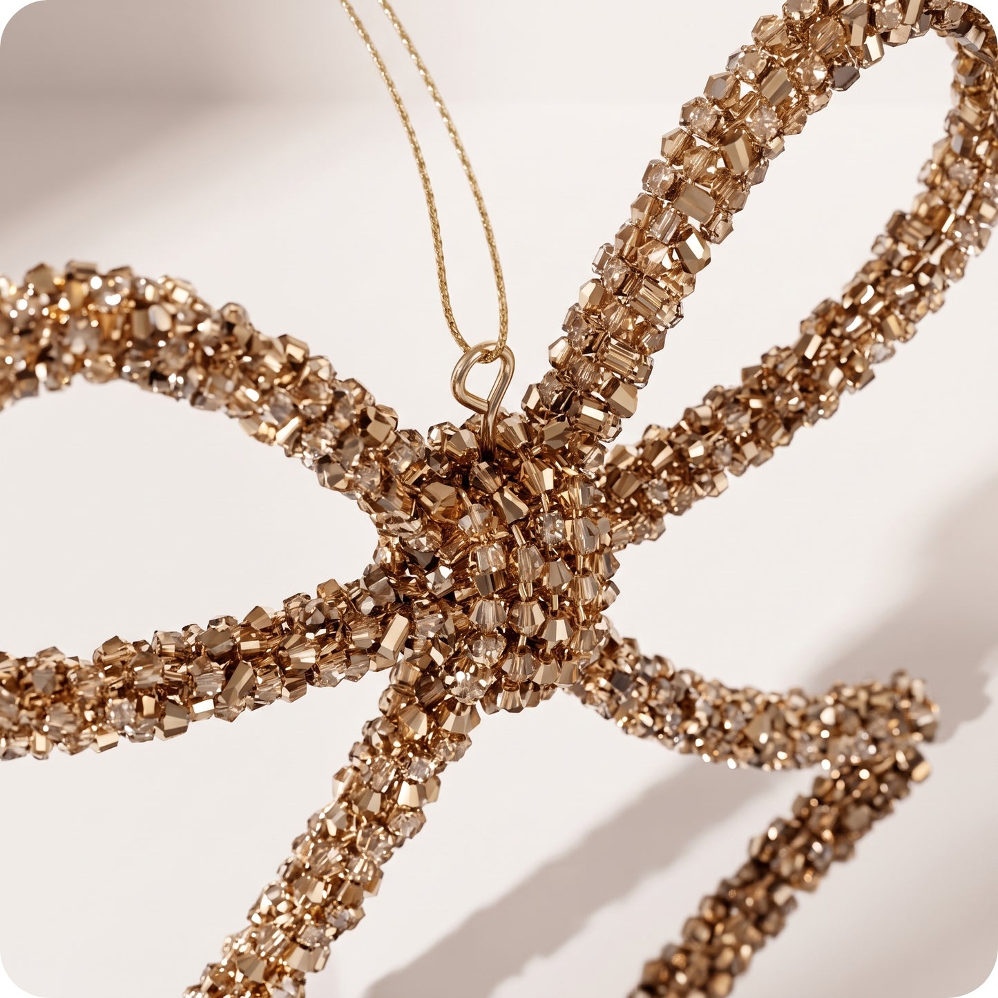 Esfera moño dorado con piedras y brillos rigido 14 cm