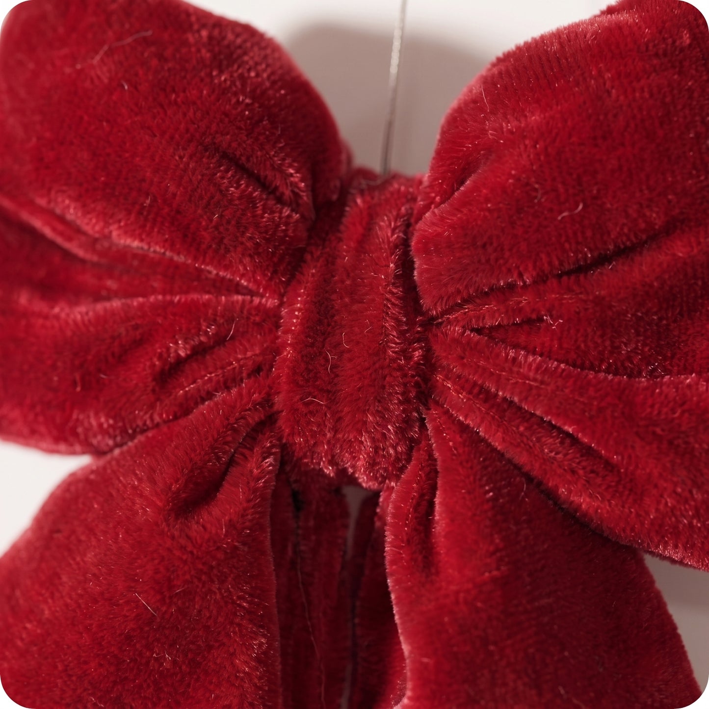 Moño de terciopelo rojo con relleno