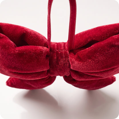 Moño de terciopelo rojo ahaltado
