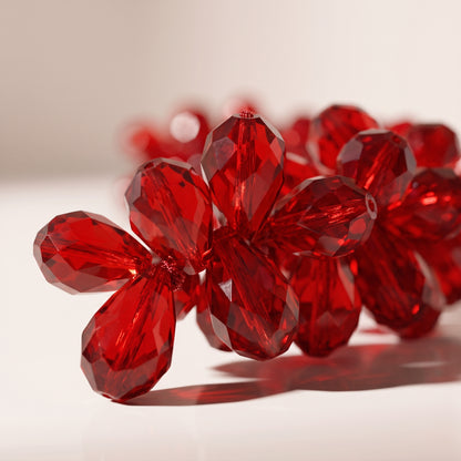 Guirnalda de piedras acrílicas roja