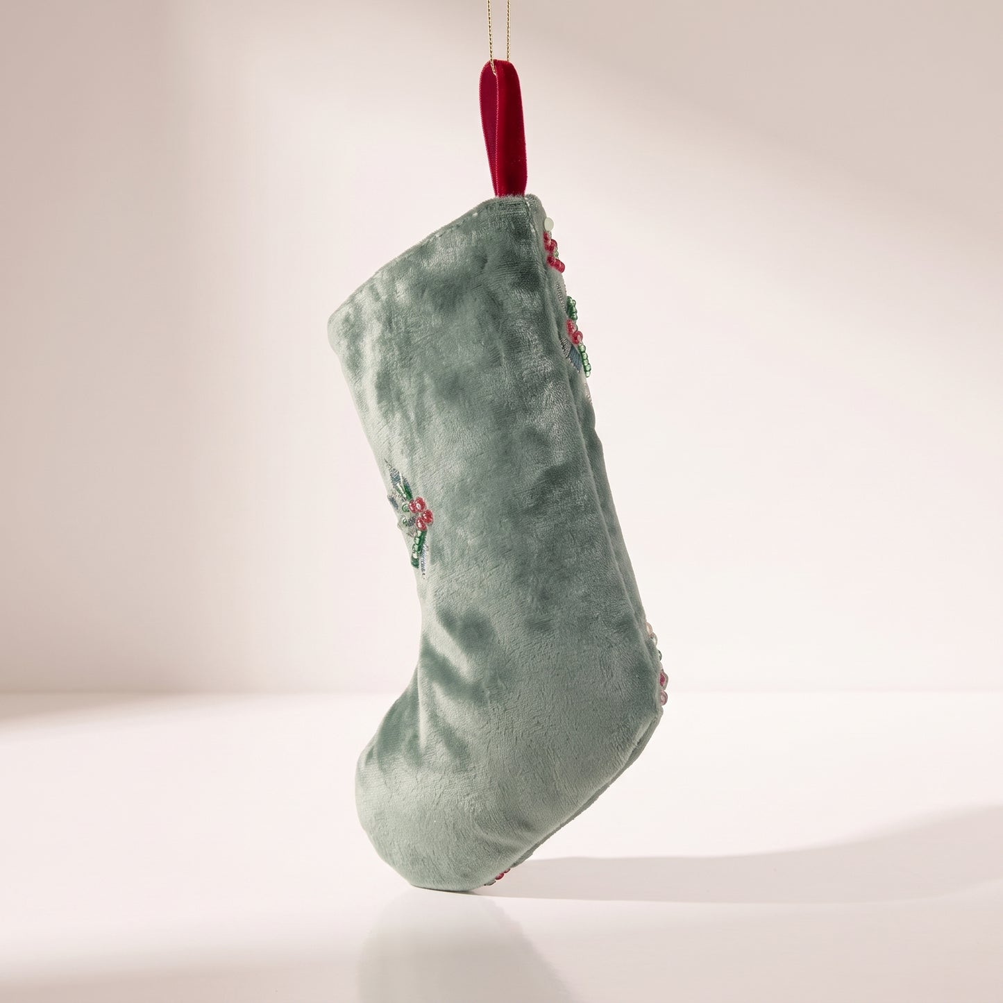 Bota de terciopelo con árbol lazo estrella