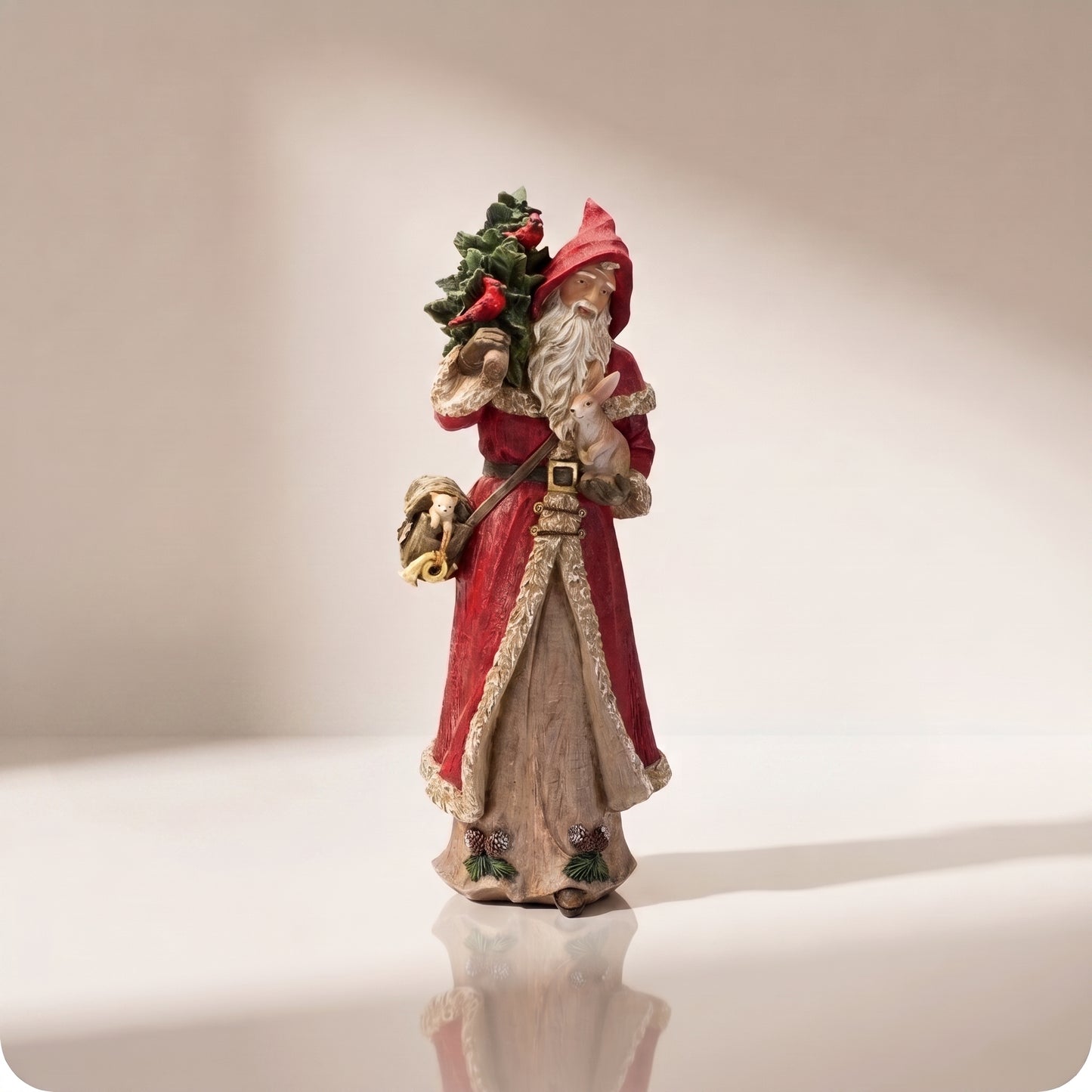 Santa de resina con árbol de navidad