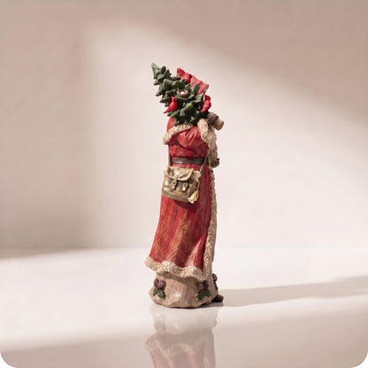 Santa de resina con árbol de navidad