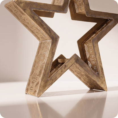 Candelabro estrella de metal con porta vela en medio