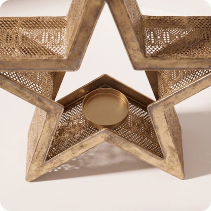Candelabro estrella de metal con porta vela en medio