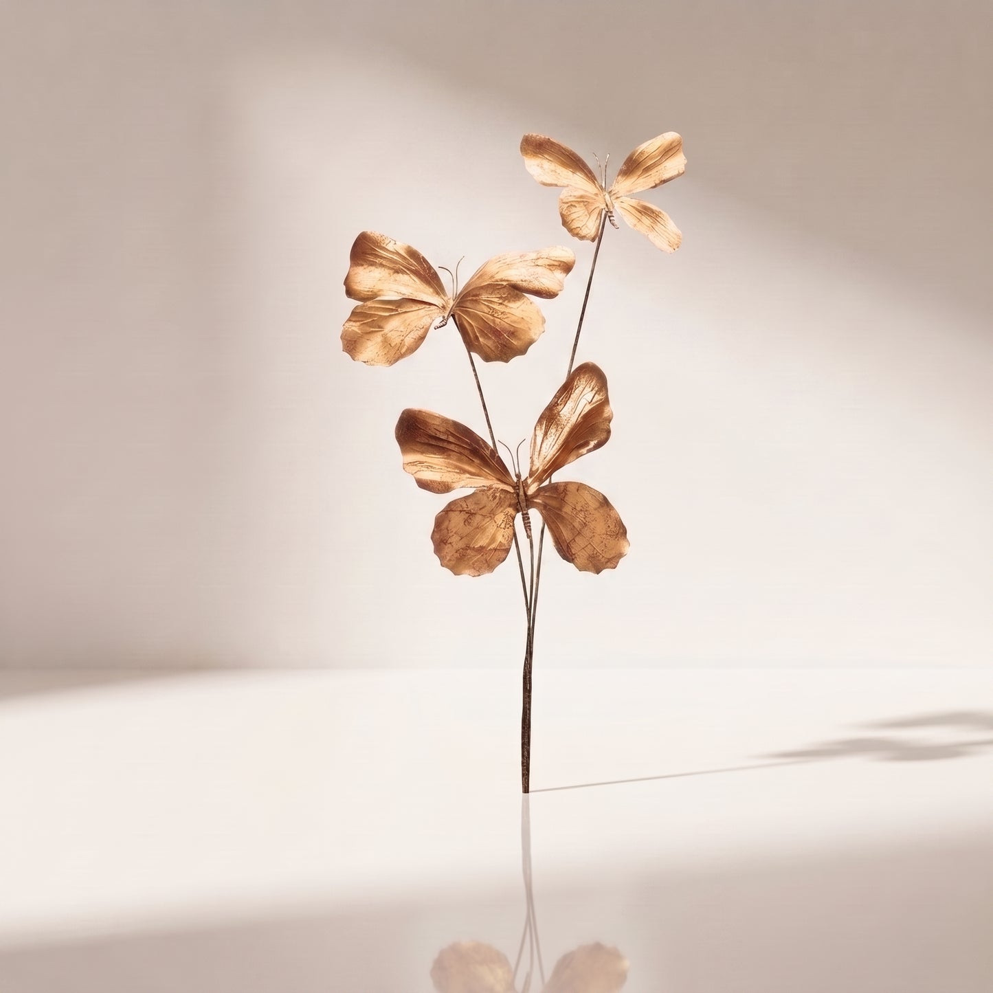 Vara de mariposas doradas