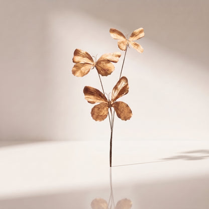 Vara de mariposas doradas