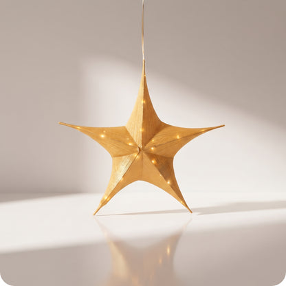 Estrella dorada 3d con luz led y baterías