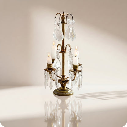 Candelabro chapado en níquel con cristal y porta velas dorado