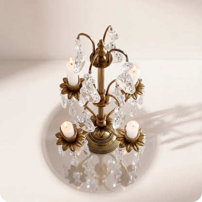 Candelabro chapado en níquel con cristal y porta velas dorado