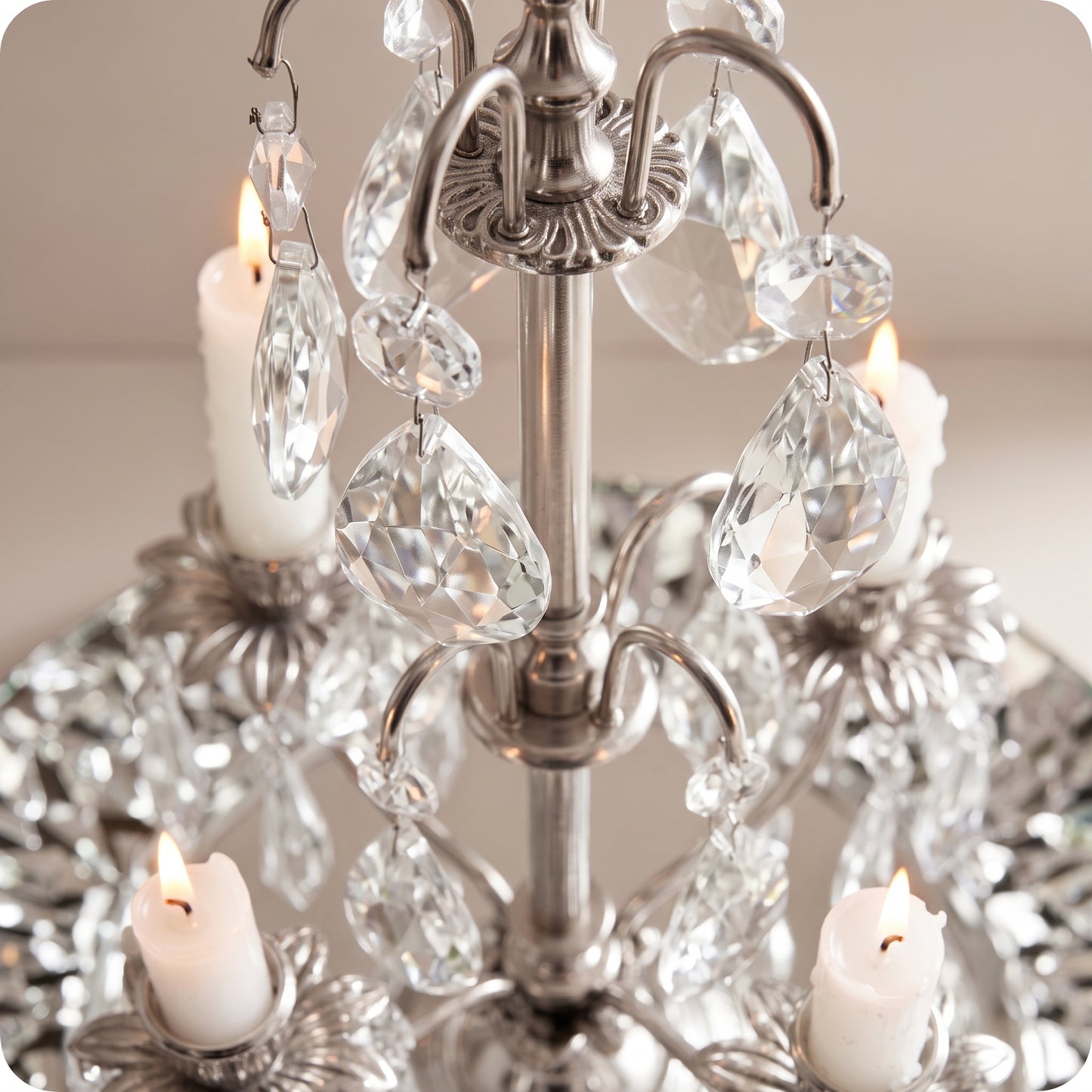 Candelabro chapado en níquel con cristal y porta velas plateado
