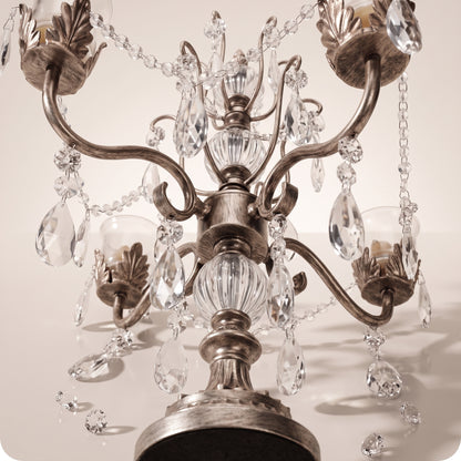 Candelabro chapado en níquel con vasos porta velas de cristal plateado