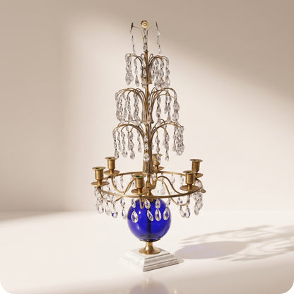 Candelabro chapado en níquel con esfera de cristal azul dorado