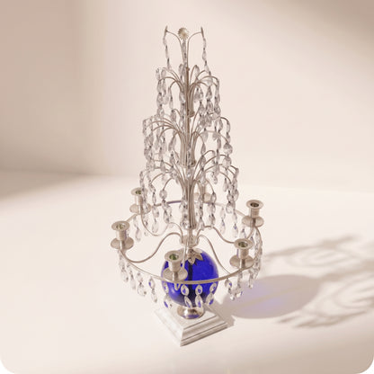 Candelabro chapado en níquel con esfera de cristal azul plateado
