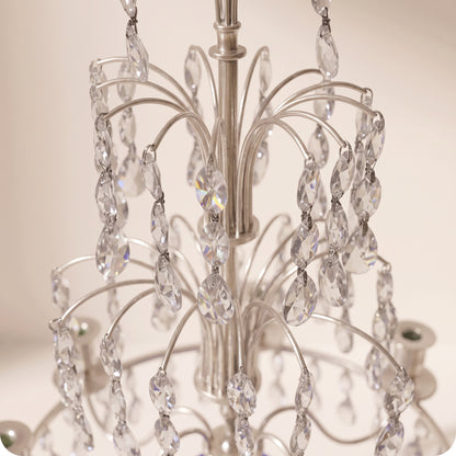 Candelabro chapado en níquel con esfera de cristal azul plateado