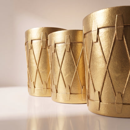 Set de tambores de resina dorados