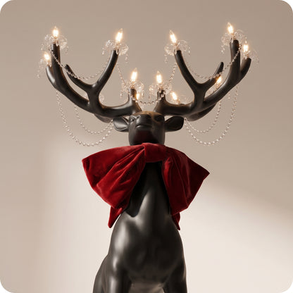Reno decorativo con candelabro negro en cuernos grande