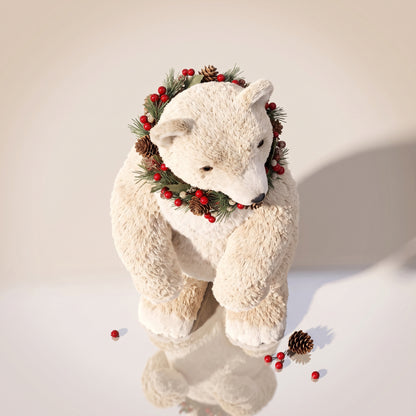 Elegante oso polar de fibra de coco con bufanda roja