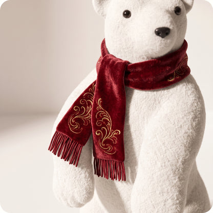 Elegante oso polar blanco con bufanda roja parado 1