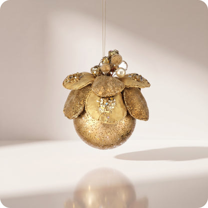 Esfera velvet con joyas y flor de magnolia dorada 11 cm