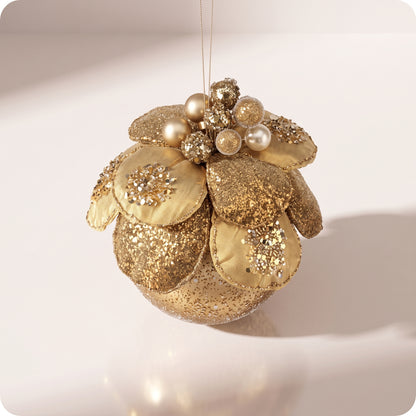 Esfera velvet con joyas y flor de magnolia dorada 11 cm