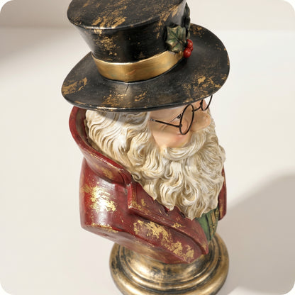 Papá noel de resina sobre pedestal
