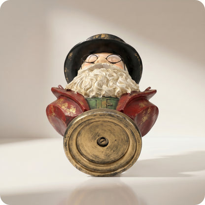 Papá noel de resina sobre pedestal