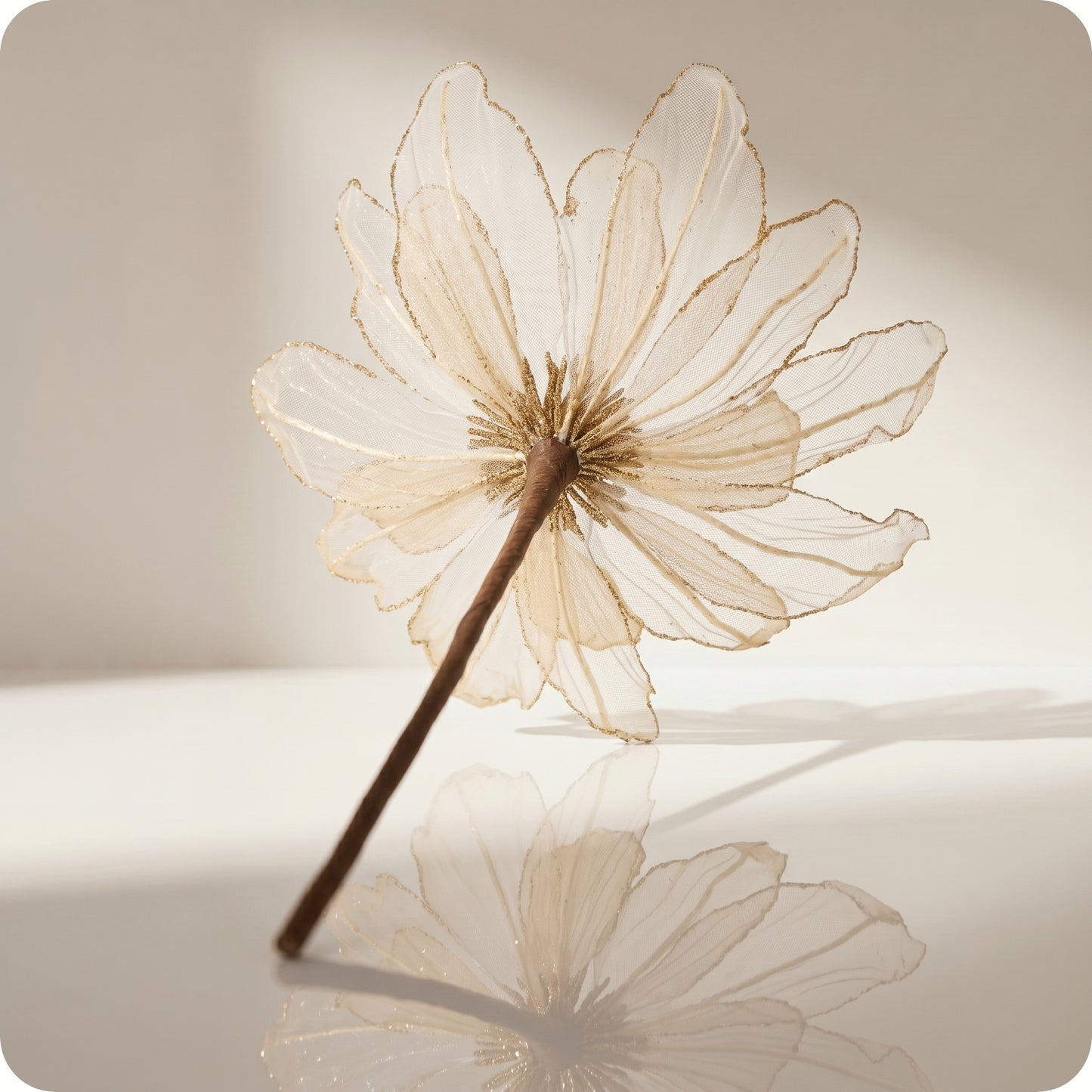 Vara de magnolia transparente con brillo oro