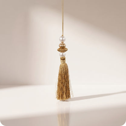 Adorno de borla con cuentas de perlas y rayas, color oro