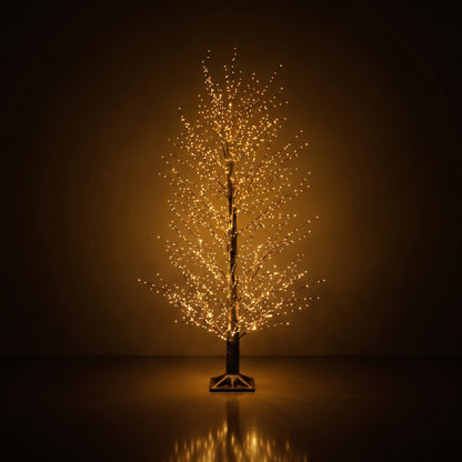 Árbol negro de micropuntos modelado de luz calida