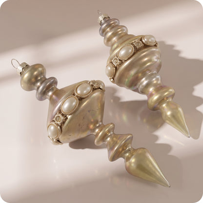 Juego de 2 adornos de relieve de cristal  dorado